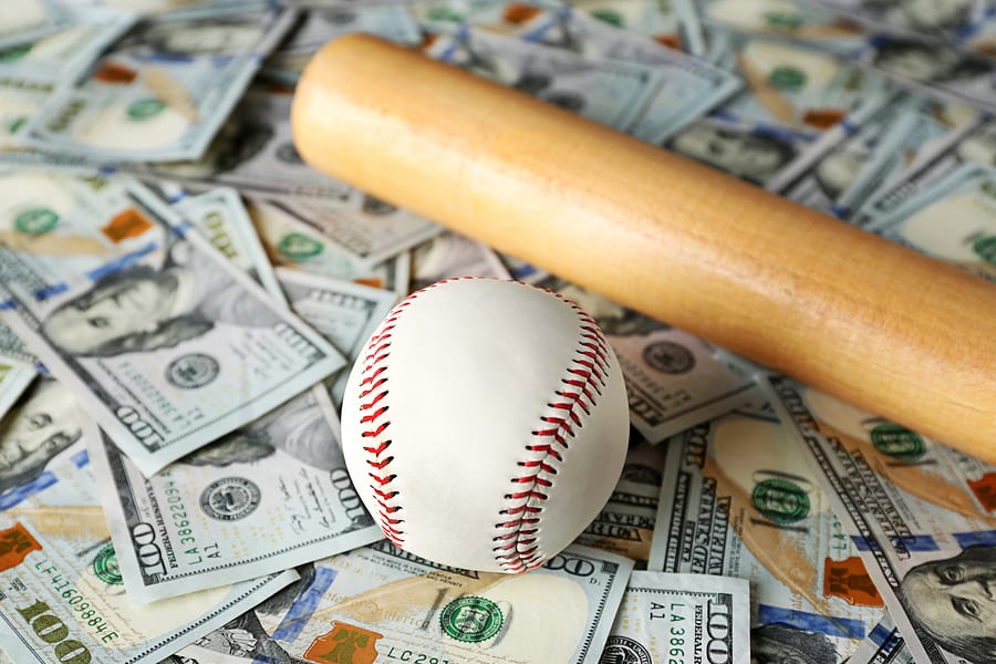 Baseball-bat and ball on dollars