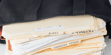 2024 Payroll Tax and Withholdings Update - a sack of folders contains payroll information